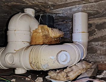PUB-certified plumber repairing concealed pipe leak in Singapore condo